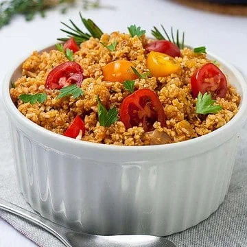 A bowl of Spanish style cauliflower rice.