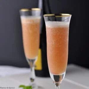 two flutes of rhubarb prosecco cocktail