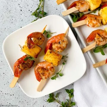 Grilleld Cajun Prawn Kabobs on skewers.