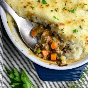 Close up view of homemade Shepherd's Pie with a serving spoon